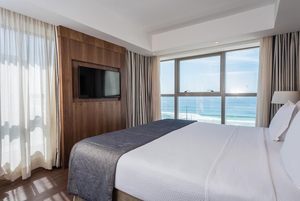 ホテル ウィンザー マラペンディ リオデジャネイロ エクステリア 写真 A bedroom at the Hilton Tel Aviv